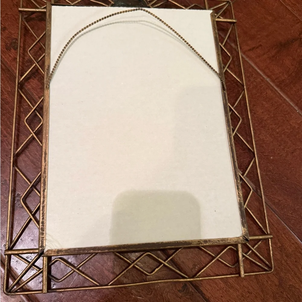 Gold Geometric Wall Mirror with Sun God.